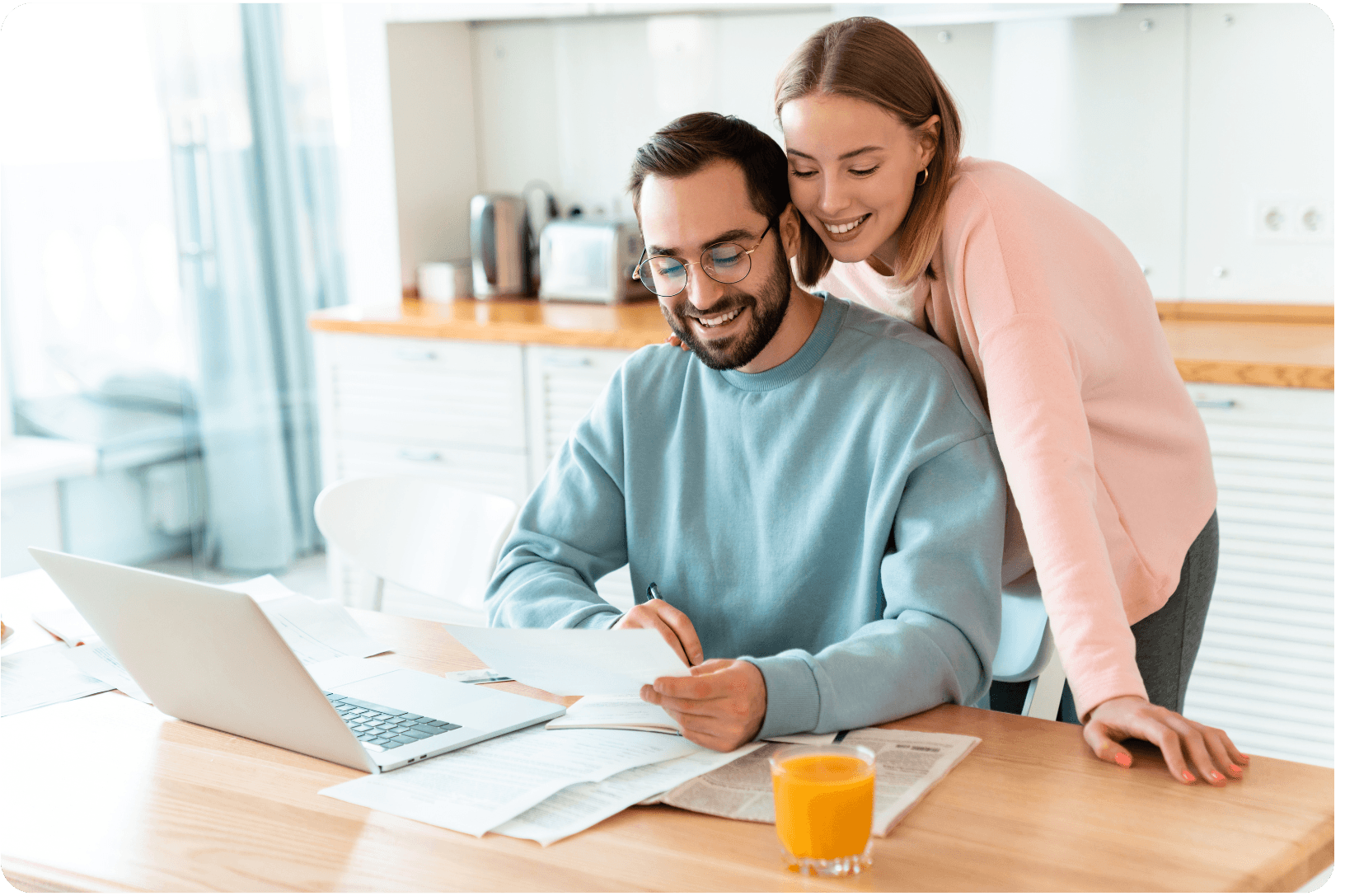 Happy couple checking prenup