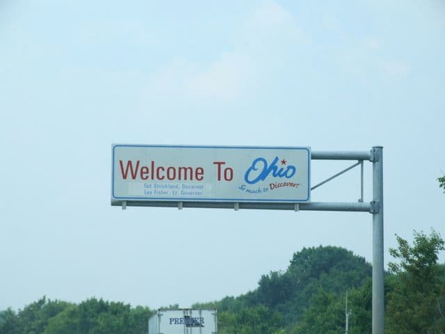 Couple signing a prenup in Ohio, preparing for marriage in Cleveland, Columbus, or Cincinnati.